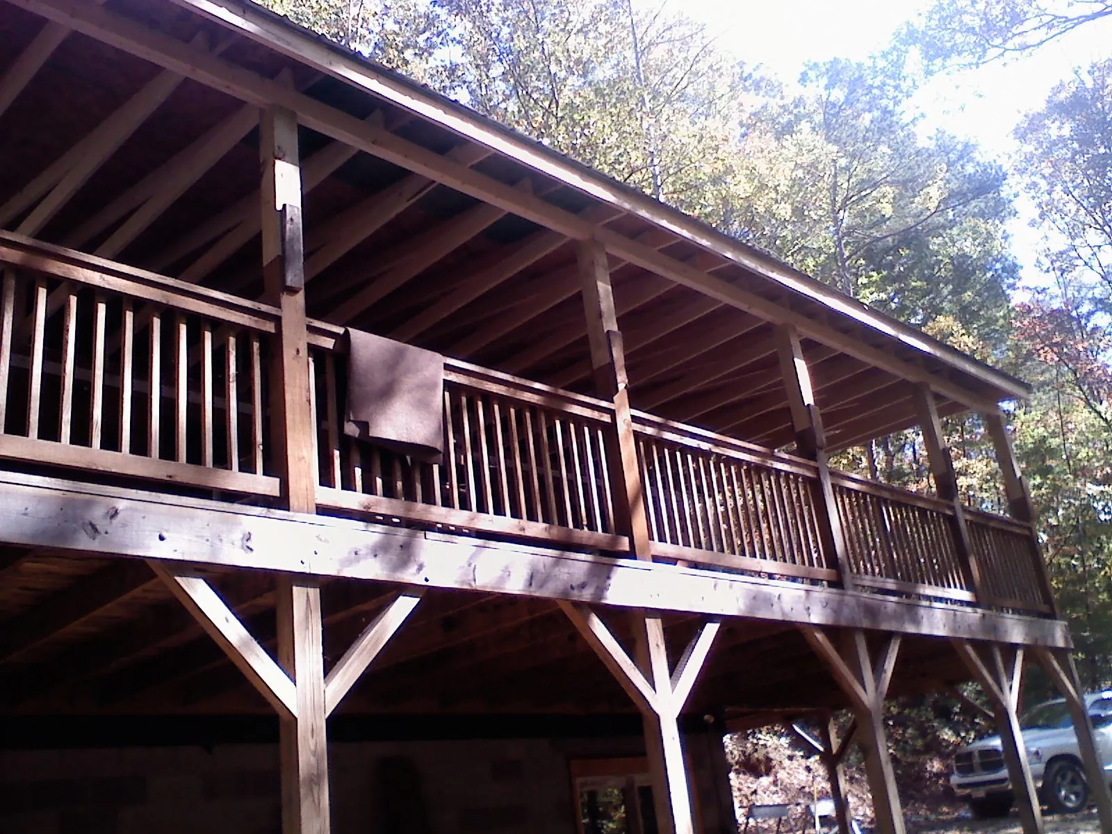 Timber framing under a new elevated porch and deck — Roof Leak Repair in Berry Creek by Roofing Brothers